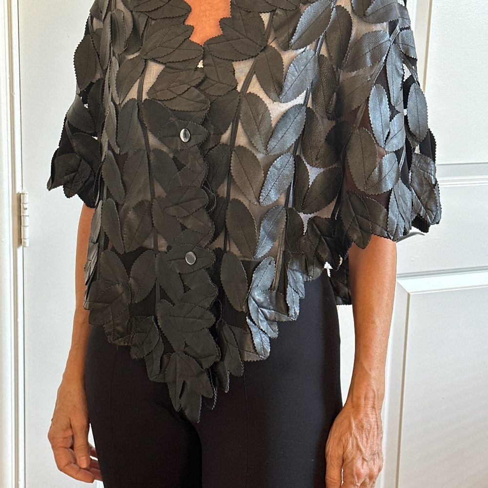 Overland black leather shawl/cape with leaf design.  Perfect condition
